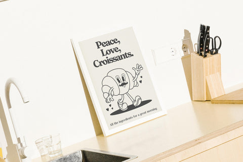Peace, Love & Croissants poster i miljö med ram som tillval – FrenzyFrame